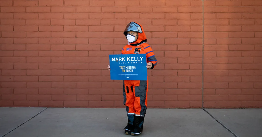 Julian Rosales poses for a portrait dressed as then-candidate Mark Kelly for Halloween on the last day of early voting at Fowler Elementary Early Voting Center in Phoenix, Arizona. Kelly went on to win his bid for US Senate, and was sworn in on Dec. 2, 2020.